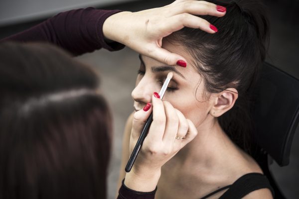 woman-applying-eye-shadow-model